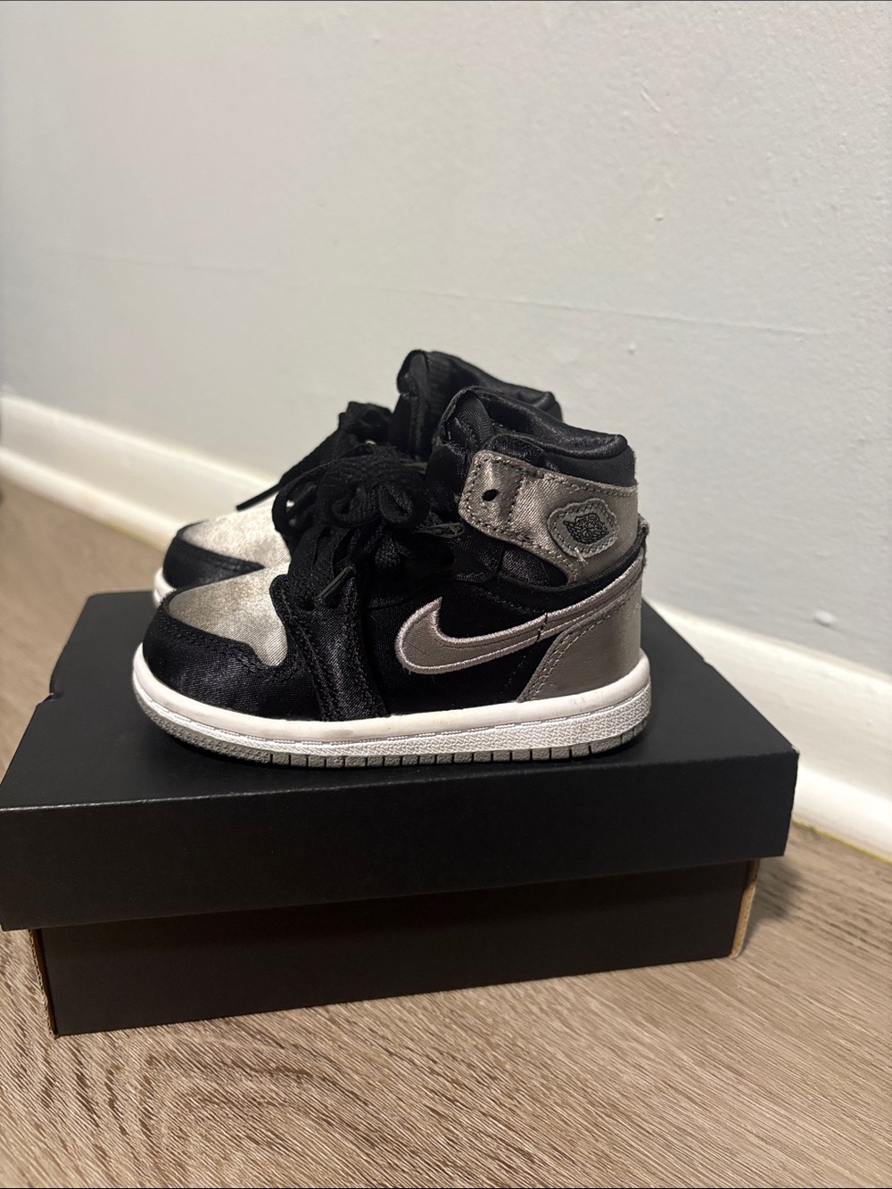 Nike Toddler Black and Gray High-Top Sneakers with Silver Swoosh
